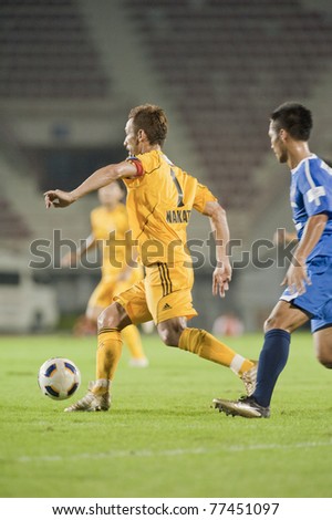 BANGKOK - MAY 17 : H.Nakata (Y) in action during Thailand-Japan Stars Charity Match between Stars Thailand (B) vs Stars Japan (Y) on May 17, 2011 at Supachalasia Stadium Bangkok,Thailand.