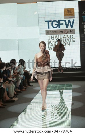 BANGKOK, THAILAND - SEPTEMBER 16 : Model showcases on the catwalk during Thailand Graduate Fashion Week 2011 on September 16, 2011 in Bangkok Thailand.