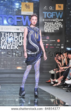 BANGKOK, THAILAND - SEPTEMBER 16 : Model showcases on the catwalk during Thailand Graduate Fashion Week 2011 ( TGFW ) on September 16, 2011 in Bangkok Thailand.