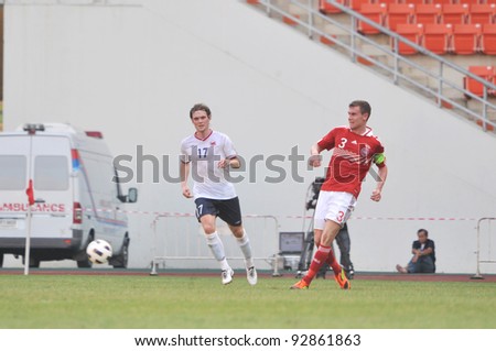 BANGKOK THAILAND - JANUARY 15 : B.Andreas (R) in action during KING\'S CUP 2012 between Denmark vs Norway on January 15, 2012 in Rajamangla Stadium,Bangkok, Thailand.