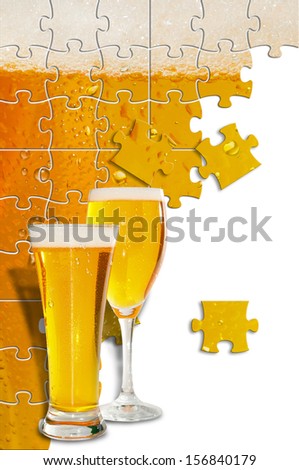 Image of beer formed by puzle pieces and two glasses in first plane