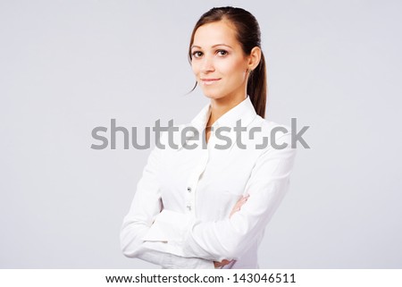 Portrait of lovely woman in white shirt