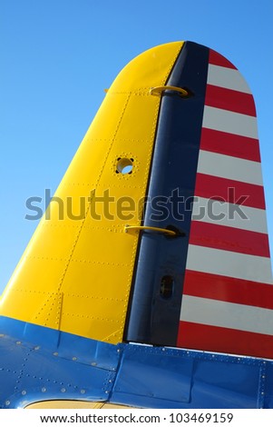 The iconic colors of World War Two American war planes is shown on the vertical stabilizer of this Consolidated-Vultee BT-13