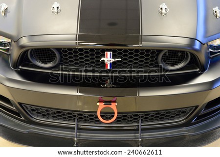 BAKERSFIELD, CA - DECEMBER 30, 2014: The front end of the Ford Mustang SHO race car exhibits the special equipment required to compete in auto racing.