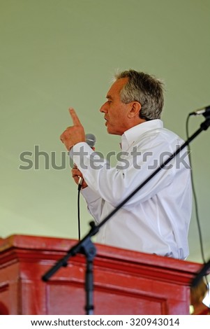 DELANO, CA - SEPTEMBER 26, 2015: Guest speaker, Robert F Kennedy, Jr, talks to the assembled UFW members and supporters gathered for the 50th anniversary of the Delano Grape Strike.