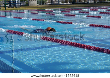 Swimmer practicing at an aquatic center
