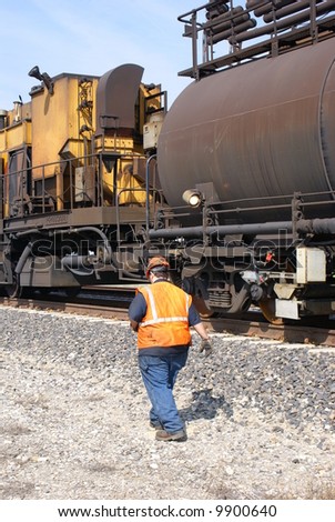Technician for a grinding train which grinds rails to provide longer service life