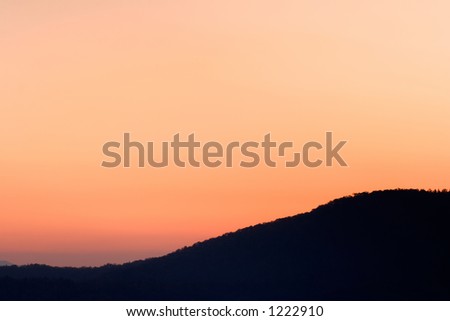 A mountain ridge silhouetted against the sunset - Smoky Mountains Nat. Park, USA.