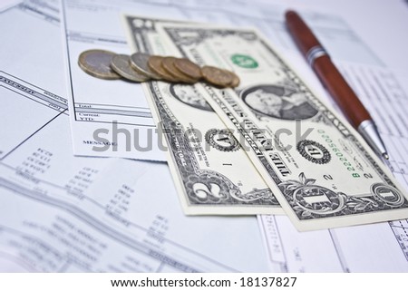 pay check and banknotes