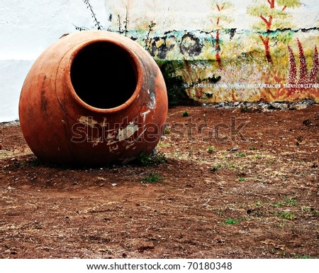 Large clay jar in the open