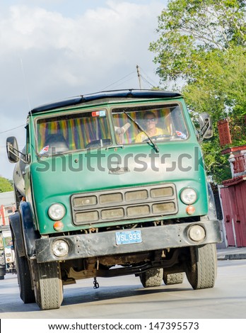 SANTA CLARA-JANUARY 7: Cuba, one of the last communist countries is changing. Its government now allows  private transportation with old vehicles. As seen on January 7,2013 in Santa Clara, Cuba