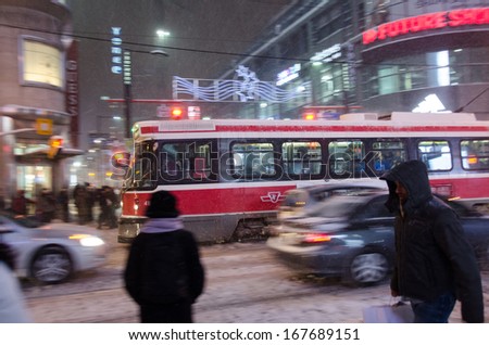 TORONTO-DECEMBER 14: Toronto is Canada\'s largest city and sixth largest government, and home to a population of about 2.8 million people. City under snowstorm. Seen in Toronto, Canada on Dec 14, 2013