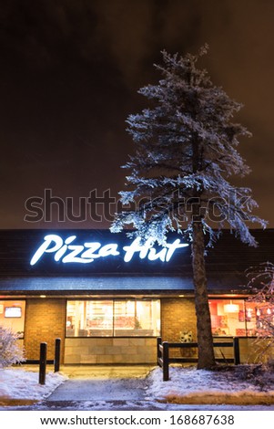 TORONTO,CANADA - DECEMBER 23: Pizza Hut Restaurant. The brand has taken root in Canadian culture.After an ice storm they remain among the few offering delivery. Seen in Toronto, Canada on Dec 23, 2013