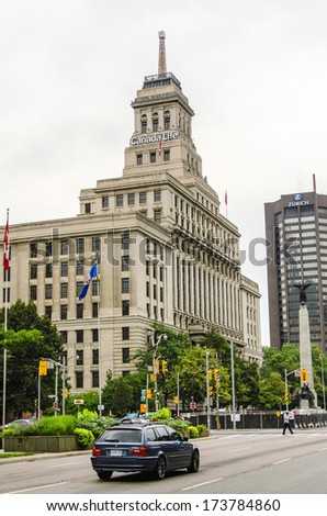 TORONTO,CANADA-APRIL 7, 2012: The Canada Life Building is a historic office building. The fifteen-floor Beaux Arts building was built by Sproatt & Rolph and stands at 321 feet with its weather beacon.