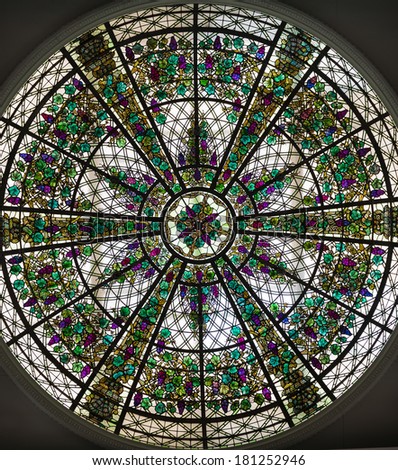 ORONTO, CANADA-MARCH 8, 2014: Vintage stained glass cupola at Casa Loma one of Toronto\'s top ten tourist attractions. Around 300,000 visitors tour Casa Loma and the Estate Gardens each year.