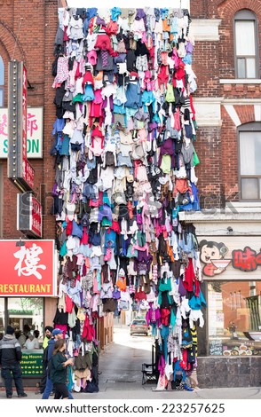 TORONTO, CANADA - OCTOBER 11, 2014: Made in China, a work of art by Maria Ezcurra  in Chinatown celebrating the Nuit Blanche of Scotia Bank. The work represent the connection between two cultures.