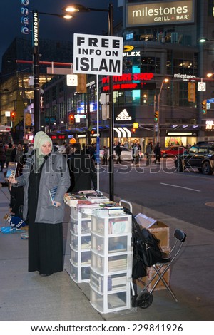 Toronto,Canada-November 9,2014: Members of the Islam Community of Toronto start divulging free info about Islam. In the booklet they explain about Jihad and separate themselves from ISIS.
