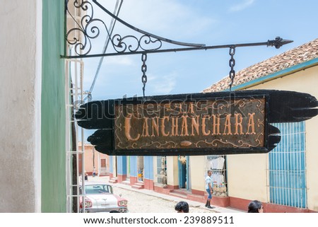 TRINIDAD,CUBA-JULY 22,2014: Scene of La Canchanchara a traditional and famous tourist bar in the colonial city. Trinidad is the eighth village founded in Cuba and a UNESCO world heritage site.