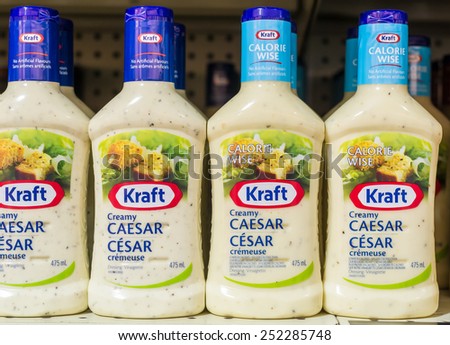 TORONTO,CANADA-FEBRUARY 11,2015: Kraft Ceasar Salad dressing in shelves. Kraft Foods Group, Inc. (KRFT) is an American grocery manufacturing and processing conglomerate headquartered in the Chicago