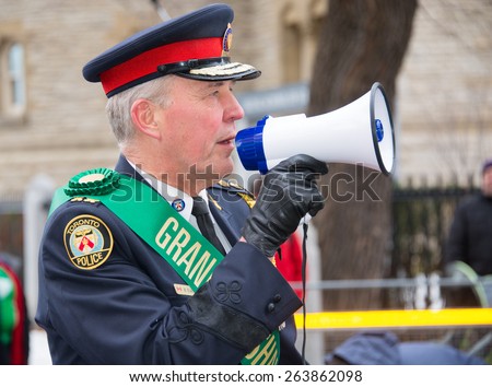 TORONTO,CANADA-MARCH 15,2015:Toronto Police Chief Bill Blair leads the 28th edition of the St. Patrick Day Parade as the Grand Marshal