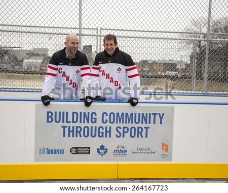 TORONTO,CANADA-JANUARY 3,2015: Michael Bartlett executive director of MLSE and Chris Bright Executive Director of Hockey Canada Foundation during the official opening of the Regent Park ice rink