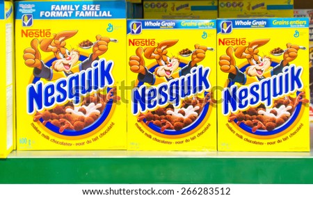 TORONTO,CANADA-APRIL 2,2015: Nestle Nesquik Cereal in a Store Shelf. NestlÃ?Â© S.A. is a Swiss multinational food and beverage company. It is the largest food company in the world measured by revenues.