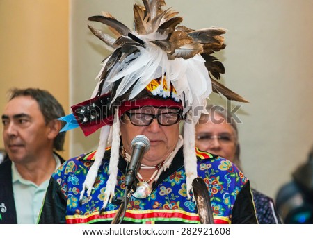 TORONTO,CANADA-MAY 30,2015: Toronto PanAm 2015 Fire Welcome Ceremony: Bryan LaForme chief of the Mississaugas of the New Credit First Nation speaks at the event