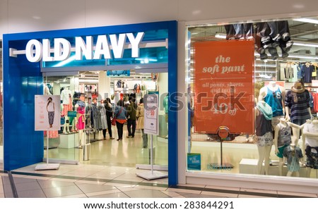 TORONTO,CANADA-MAY 25,2015: Old Navy clothing store draws a crowd to its latest sale.Old Navy is a popular clothing and accessories retailer owned by American multinational corporation Gap Inc.