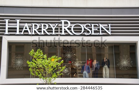 TORONTO,CANADA-MAY 17,2015:  Harry Rosen sign or logo in store front. Harry Rosen Inc. is a Canadian retail chain of 15 luxury men\'s clothing stores. A privately owned company.
