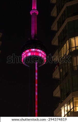 TORONTO,CANADA-JULY 5,2015: The CN Tower is declared PanAm games main attraction. It will feature state of the art led lights combinations at night. Here some of the combinations while trial phase