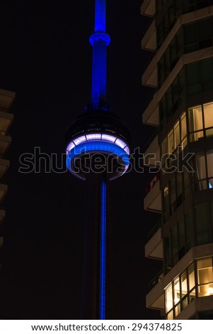 TORONTO,CANADA-JULY 5,2015: The CN Tower is declared PanAm games main attraction. It will feature state of the art led lights combinations at night. Here some of the combinations while trial phase