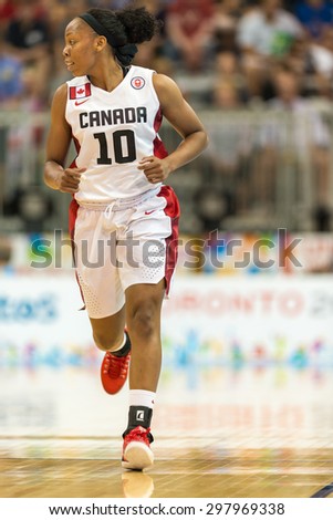 TORONTO,CANADA-JULY 16,2015: Toronto 2015 Pan Am or Pan American Games, women basketball: Nirra Fields (10) from team Canada moves swiftly without ball during an attack.CN 01953074