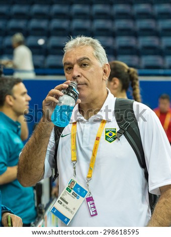 TORONTO,CANADA-JULY 16, 2015: Toronto 2015 Pan Am or Pan American Games, women basketball: Luiz Augusto Zanon coach of Brazil drinks water after the game against the US is over.CN 01953074