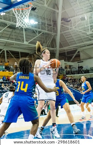 TORONTO,CANADA-JULY 16, 2015: Toronto 2015 Pan Am or Pan American games, Brazil vs USA: Breanna Stewart leads the United States offensive with 26 points. Ramona from Brazil defends.CN 01953074