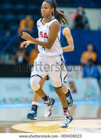 TORONTO,CANADA-JULY 20,2015: Toronto 2015 Pan Am or Pan American Games, women basketball: Moriah Jefferson rushes to join the team USA attack in Brazil area.