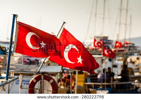 Turkish flags on boats moored at Bodrum, Turkey.
