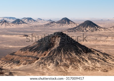 Volcanic mountains in Black Desert near the Bahariya Oasis in Egypt.