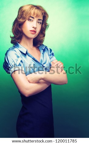 Portrait of young charming lady in stylish dress.