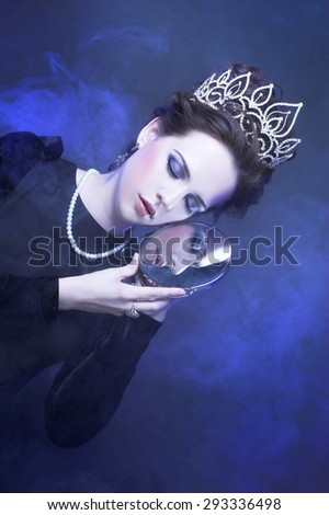 Queen. Young lady posing in crown.