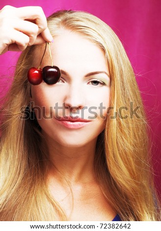 Portrait of young woman with cherry's