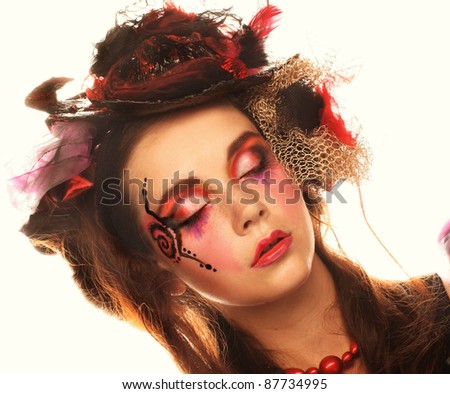 Portrait of young charming lady in creative image.