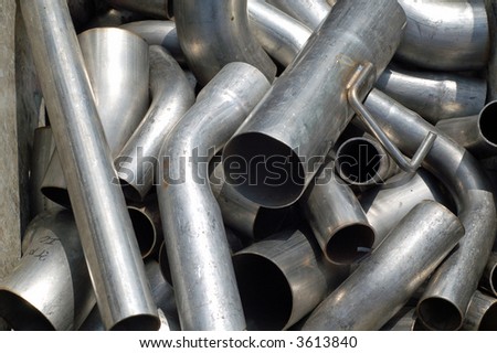 Box of car exhaust pipes