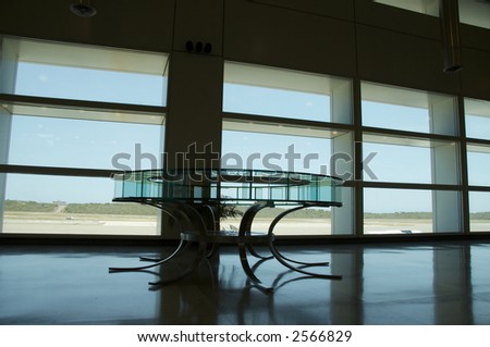 Glass table  in the waiting lounge in airport