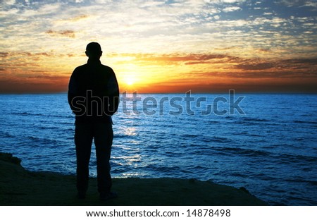 men silhouette on the sea background