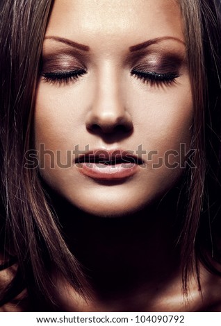 closeup portrait of a young beautiful sensual woman with perfect clean skin face , make up