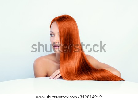 beautiful girl with long red hair