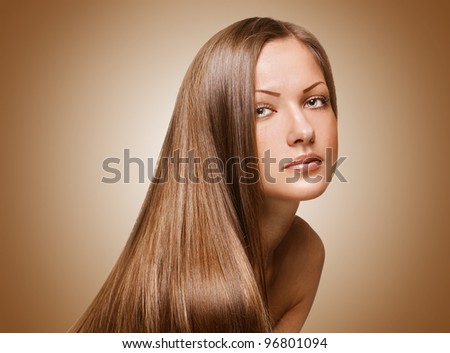 fashion portrait of a woman with beautiful long shiny hair  , clean face