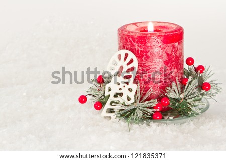 close up of holiday decorations on a white snow background