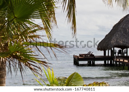 relaxing tropical beach bar on the caribbean waters of Belize