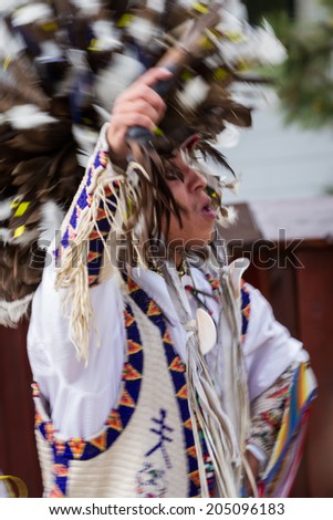 Crazy Horse Memorial, South Dakota  - June 15 : Native American performing for a crowd in the Black HIlls, June 15 2014 in the Crazy Horse memorial, South Dakota